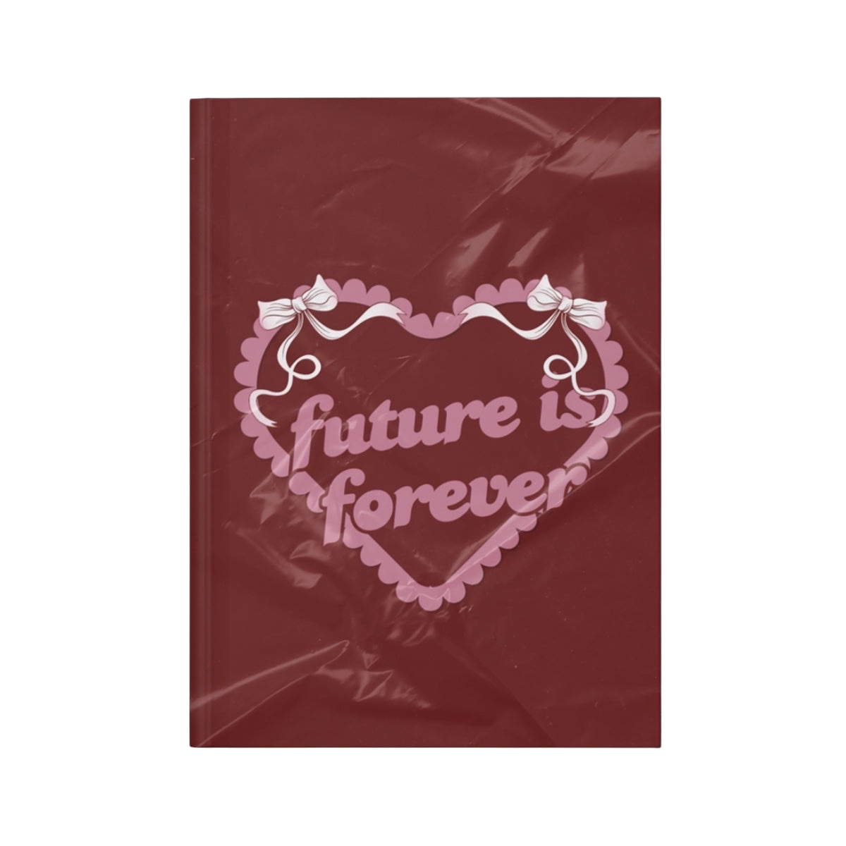 Future Is Forever Nurture the Vision journal in deep red with a pink heart graphic and Y2K inspired bow details.