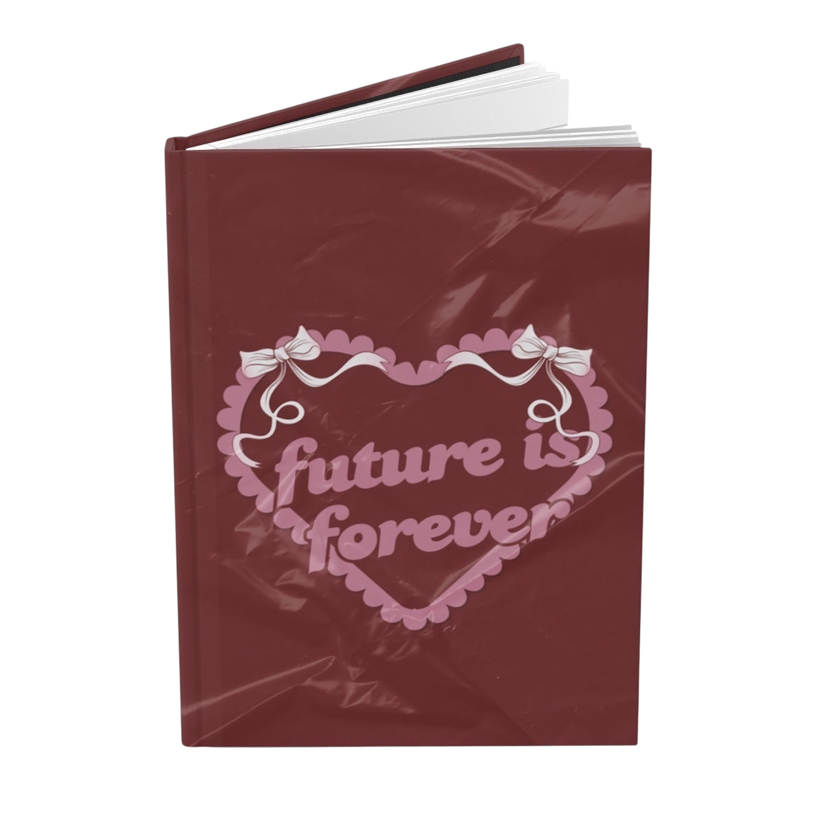 Future Is Forever Nurture the Vision journal in deep red with a Y2K-inspired pink heart and bow graphic cover.