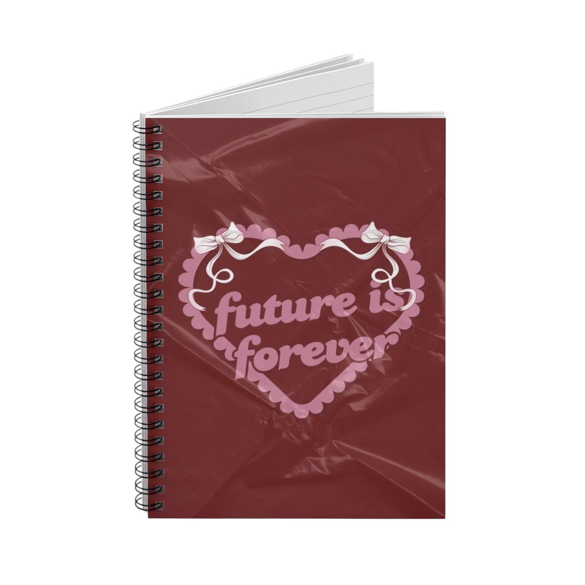 Future Is Forever Nurture the Vision spiral journal with a deep red cover, pink heart graphic, and ribbon details.