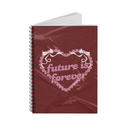 Future Is Forever Nurture the Vision spiral journal with a deep red cover, pink heart graphic, and ribbon details.
